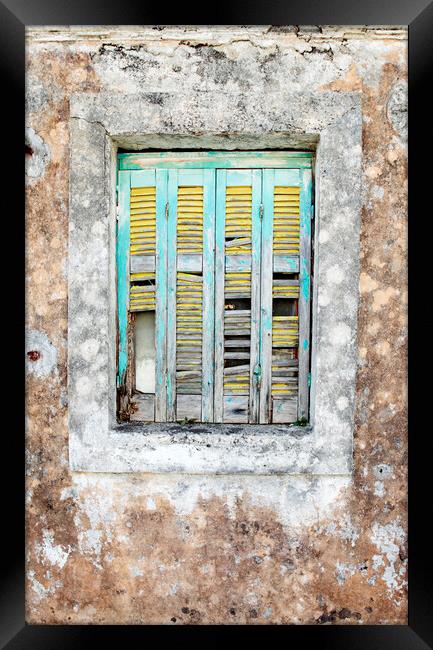 Old wooden shuttered window in Lesvos, Greece Framed Print by Neil Overy