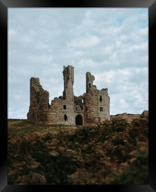 Dunstanburgh Castle in Winter Framed Print by Dan Beegan