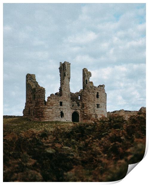 Dunstanburgh Castle in Winter Print by Dan Beegan