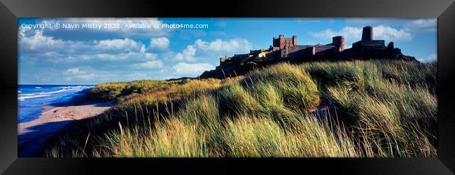 A view of Bamburgh Castle and the sand dunes, Northumberland Framed Print by Navin Mistry