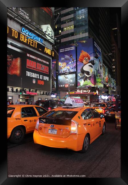 Times Square New York City at Night Framed Print by Chris Haynes