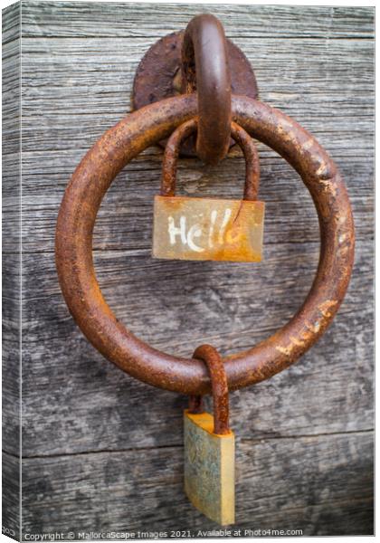 rusty padlock and iron ring Canvas Print by MallorcaScape Images