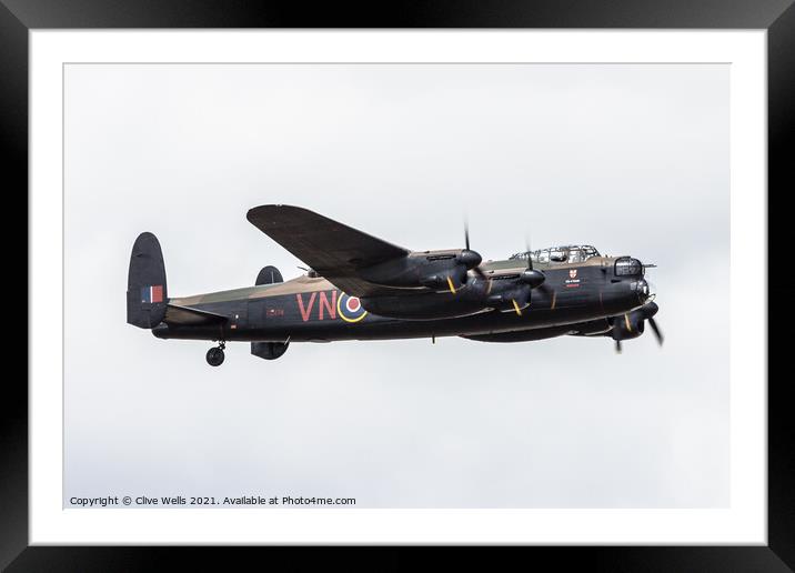 Lancaster flypast Framed Mounted Print by Clive Wells