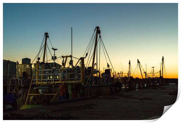 Silhouette of fishing boats Print by Clive Wells