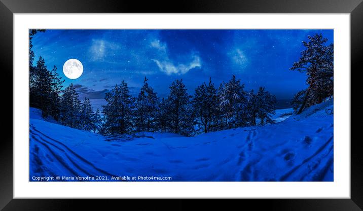 Winter night in snowy forest with full moon Framed Mounted Print by Maria Vonotna