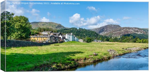 Goldrill Beck and Patterdale Village Canvas Print by Angus McComiskey