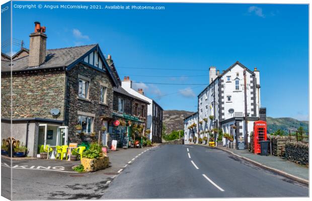 Main street in Patterdale Village Canvas Print by Angus McComiskey