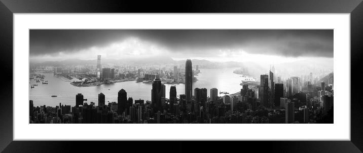 Hong Kong and Lions rock at night Framed Mounted Print by Sonny Ryse