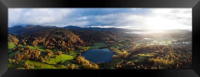 Loughrigg Tarn in autumn in the Lake District Framed Print by Sonny Ryse