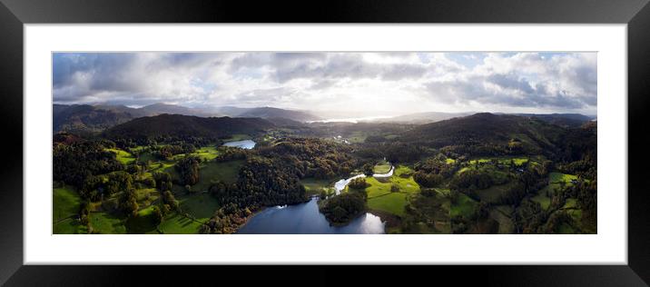 Loughrigg Tarn in autumn in the Lake District Framed Mounted Print by Sonny Ryse