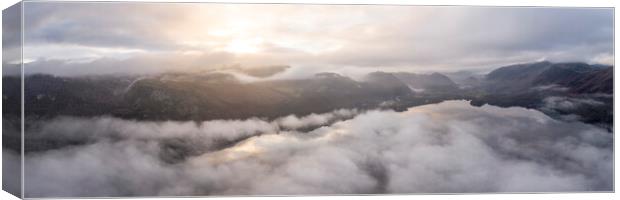 Dewentwater covered in fog at sunrise Canvas Print by Sonny Ryse