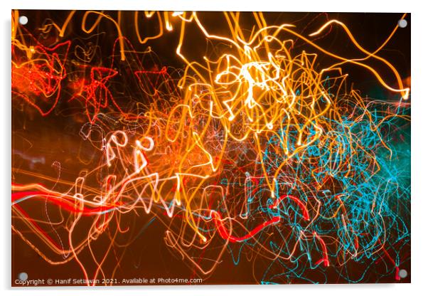 Abstract shapes of glowing swirled neon light Acrylic by Hanif Setiawan