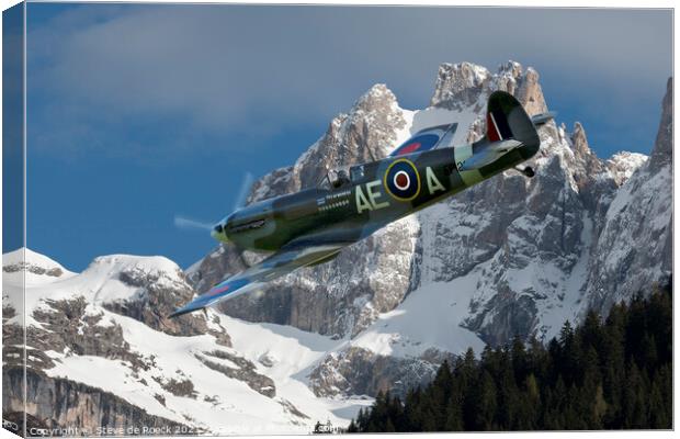 Spitfire LFVb Amongst The Mountain Peaks Canvas Print by Steve de Roeck