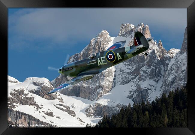 Spitfire LFVb Amongst The Mountain Peaks Framed Print by Steve de Roeck