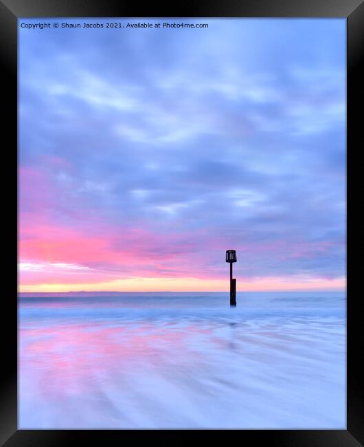 Solitude on Swanage beach  Framed Print by Shaun Jacobs