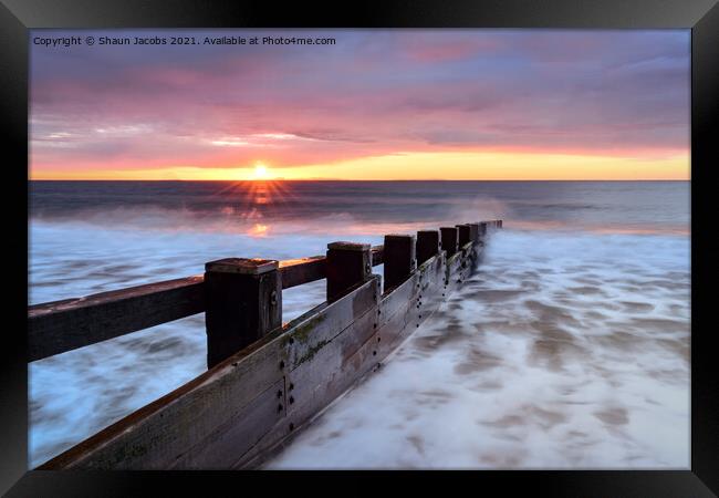 Swanage beach sunrise  Framed Print by Shaun Jacobs