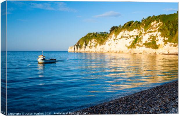Fishing boat at Beer, Devon Canvas Print by Justin Foulkes