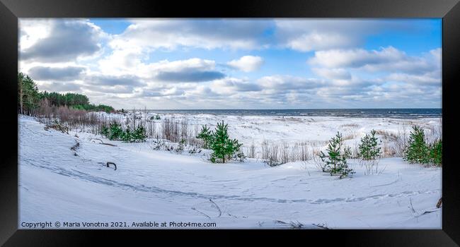 Snowy Baltic sea coast Framed Print by Maria Vonotna