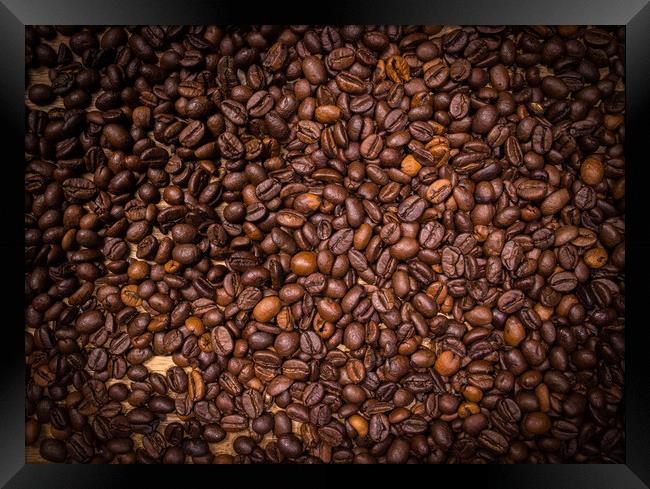 Coffee beans as background picture - top down view Framed Print by Erik Lattwein