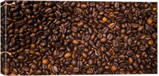 Coffee beans as background picture - top down view Canvas Print by Erik Lattwein