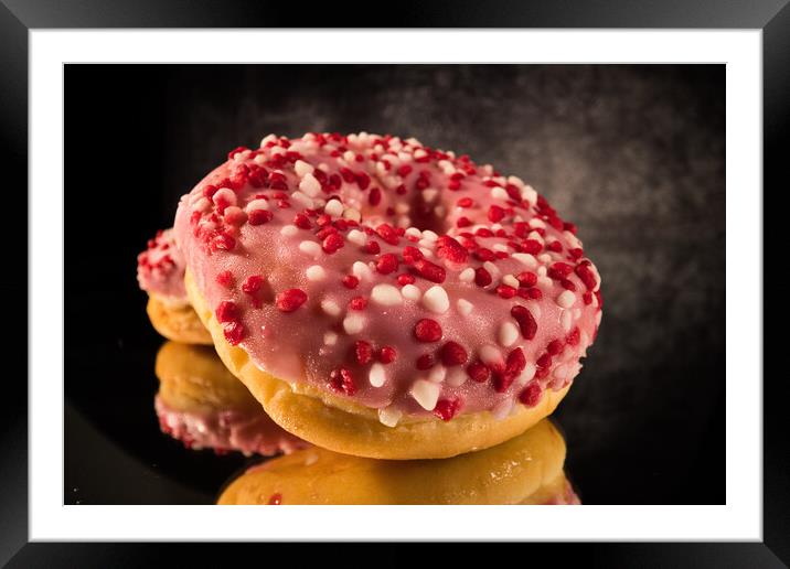 Sweet doughnuts in close-up view - macro shot Framed Mounted Print by Erik Lattwein