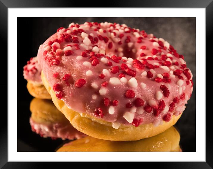 Sweet doughnuts in close-up view - macro shot Framed Mounted Print by Erik Lattwein