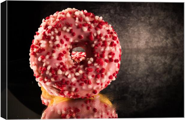 Strawberry sugar doughnuts in close-up view - macro shot Canvas Print by Erik Lattwein