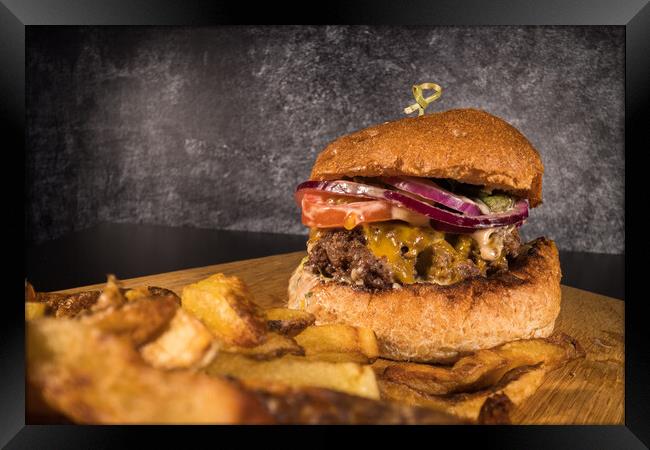 Close-up of a Hamburger - ready to eat Framed Print by Erik Lattwein