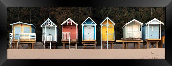 Colourful English Beach huts Framed Print by Sonny Ryse