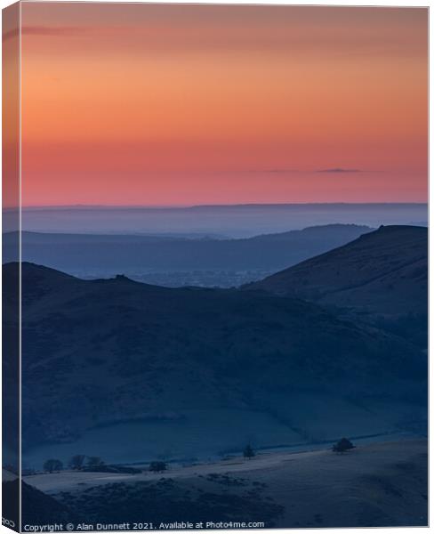 Early sunrise over the Shropshire Hills Canvas Print by Alan Dunnett