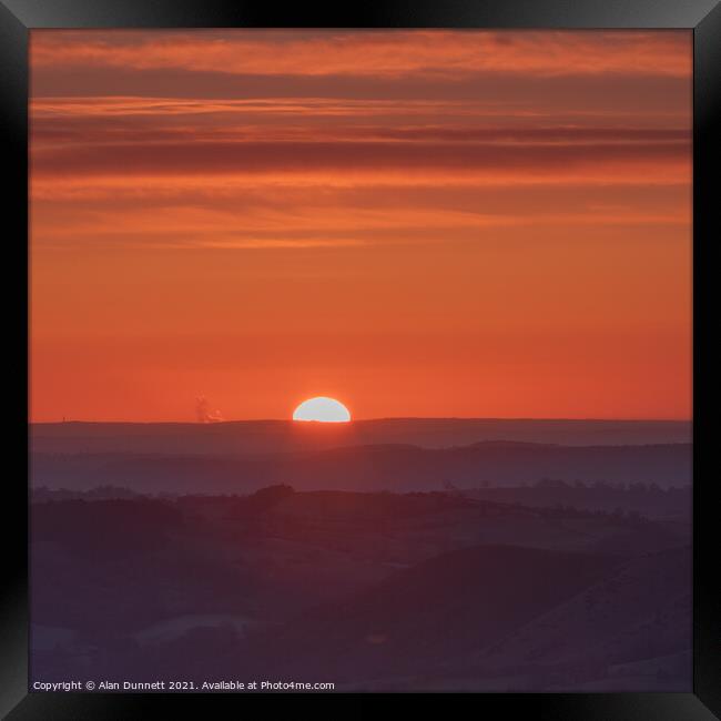 Rising sun over the Shropshire Hills Framed Print by Alan Dunnett