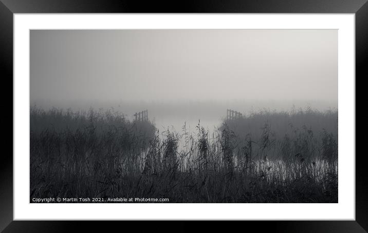 Waterways. Reeds and fences in misty Norfolk Broads Framed Mounted Print by Martin Tosh