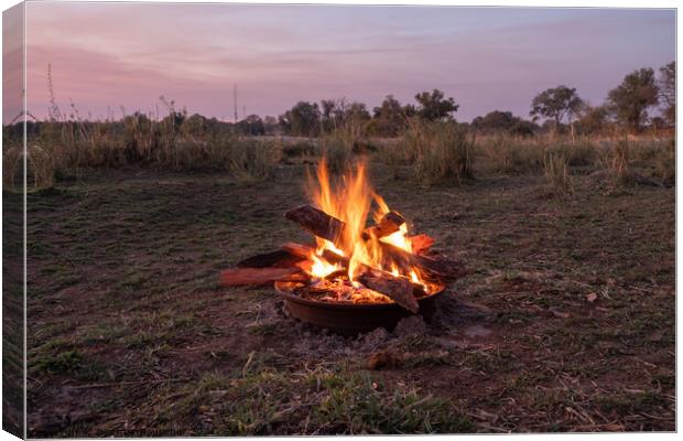 Blazing Camp Fire in Nature at the Okawango, Africa Canvas Print by Dietmar Rauscher