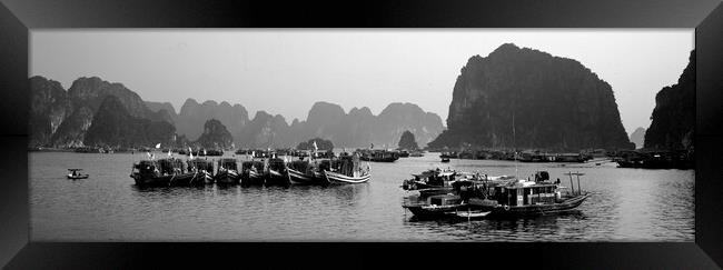 Ha Long Bay fishing boats Vietnam Framed Print by Sonny Ryse