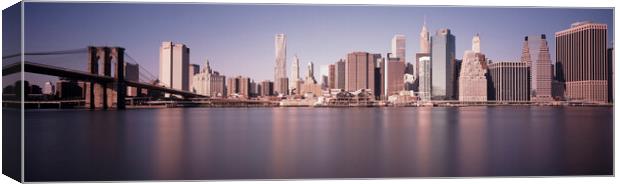 New York Cityscape and the Brooklyn Bridge USA Canvas Print by Sonny Ryse