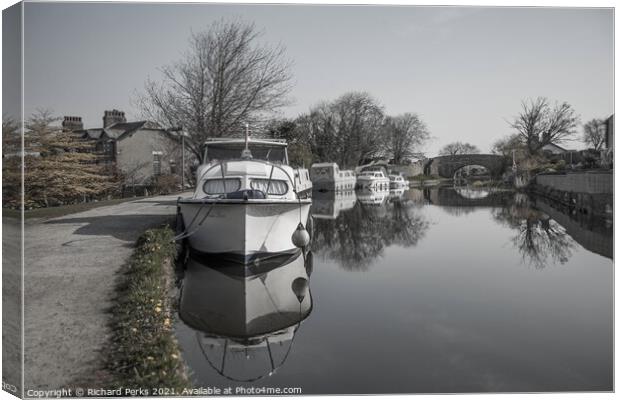 Reflections on the Lancaster Canal Canvas Print by Richard Perks