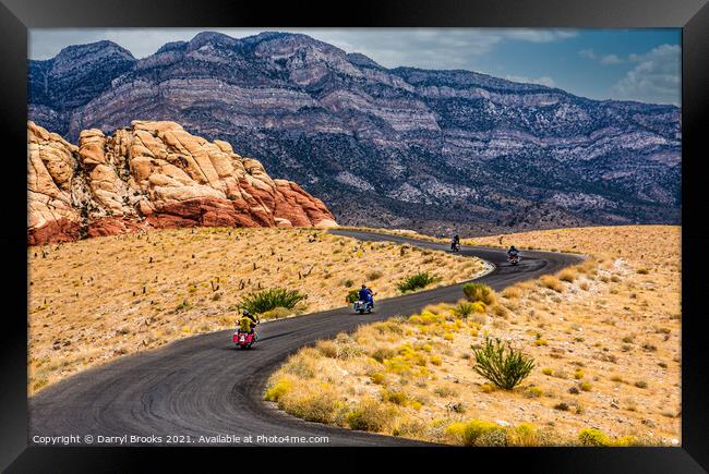 Motorcyclists on the Desert Highway Framed Print by Darryl Brooks