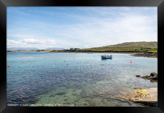 A fishing boat moored in Achill Sound, Co Mayo, Ireland Framed Print by Dave Collins