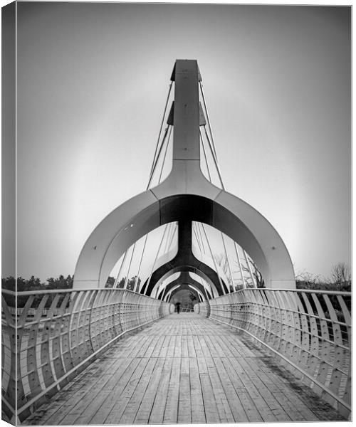 Solvesborg Pedestrian Bridge with Jogger Canvas Print by Antony McAulay