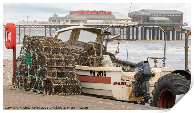 Crab pots and fishing boat on Cromer beach Print by Chris Yaxley
