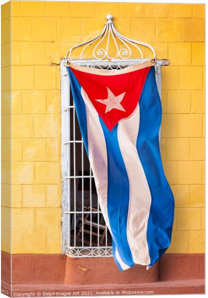 Cuban flag at a window in Trinidad Cuba Canvas Print by Delphimages Art