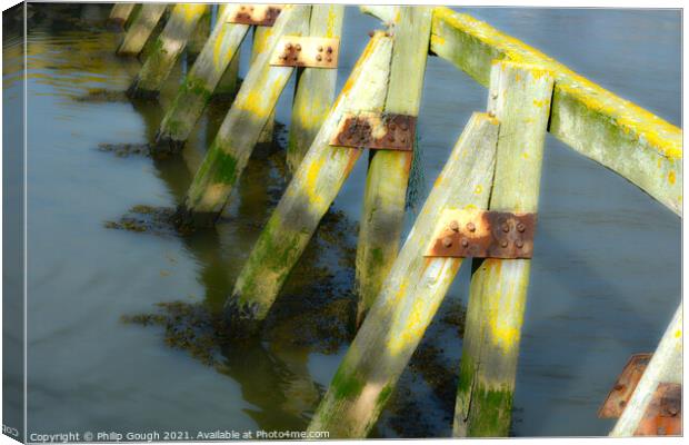 Wooden Harbour Barriers Canvas Print by Philip Gough