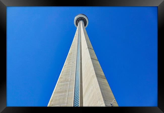 Famous CN Tower overlooking Ontario lake Framed Print by Elijah Lovkoff