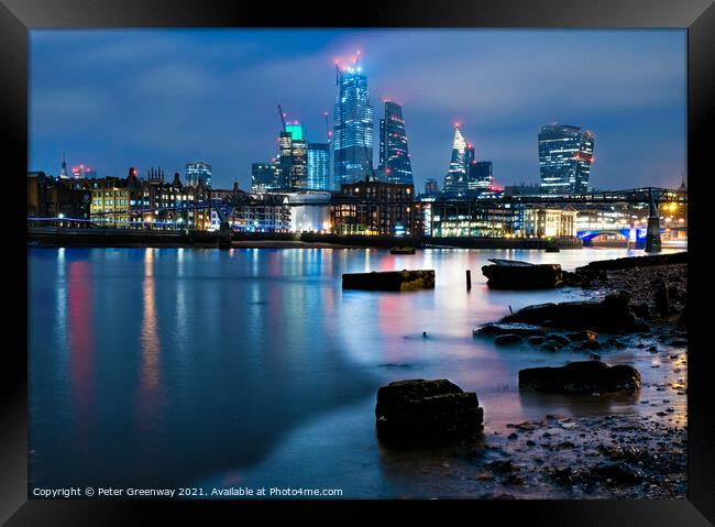 London Skyline from River Thames Shore at Nighttime Framed Print by Peter Greenway