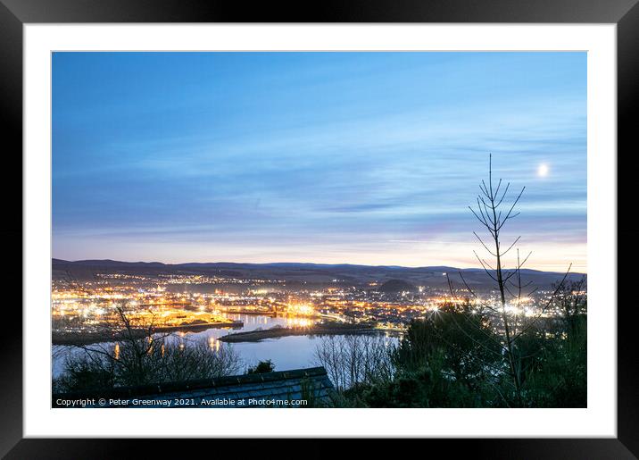 Inverness In Scotland from above on a winters even Framed Mounted Print by Peter Greenway