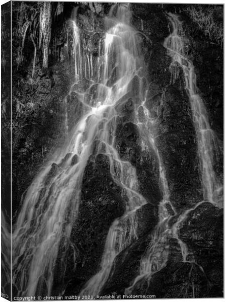 Icicles in a waterfall Canvas Print by christian maltby
