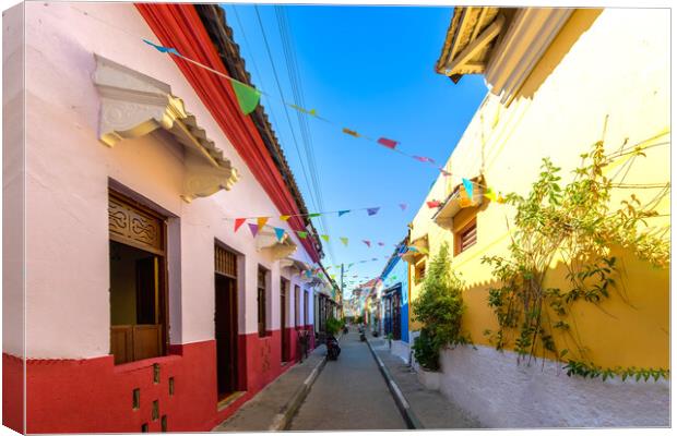 Colombia, Scenic colorful streets of Cartagena in historic Getsemani district near Walled City, Ciudad Amurallada, a UNESCO world heritage site Canvas Print by Elijah Lovkoff