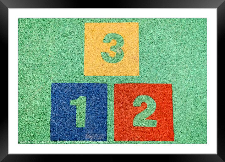 Blocks with the numbers one, two and three, positions on a podiu Framed Mounted Print by Joaquin Corbalan