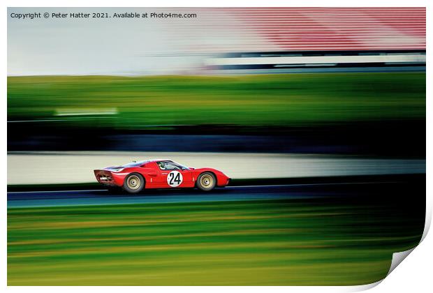 A fast red car on a track. Print by Peter Hatter