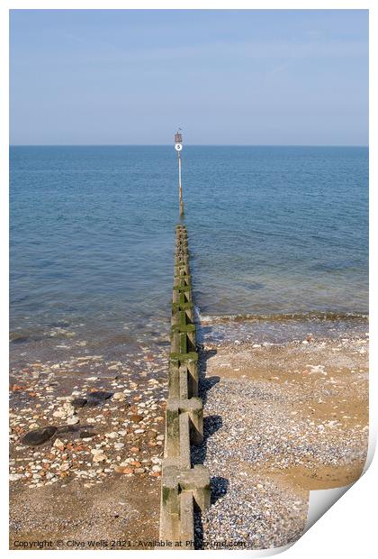 Groyne sea defence going out to sea Print by Clive Wells